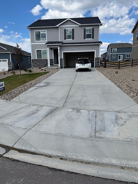 House facade, long driveway