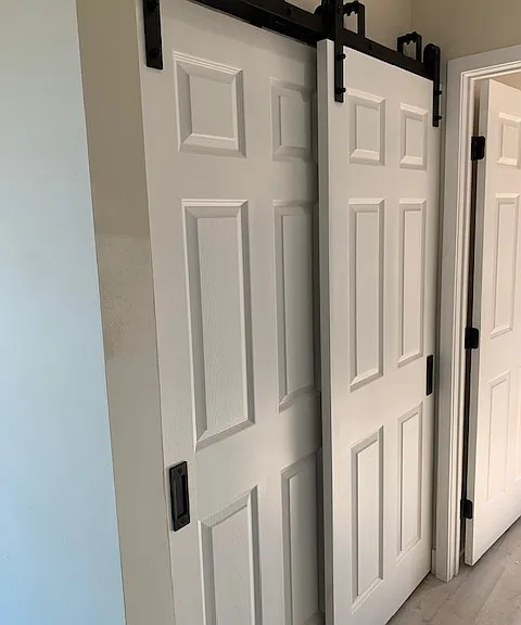 barn door to laundry closet