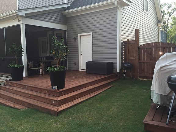 Very private back yard with deck and screen porch
