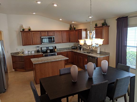 New kitchen appliances, granite counter tops, all of the kitchen dishes and pans provided and a comfortable table for six.