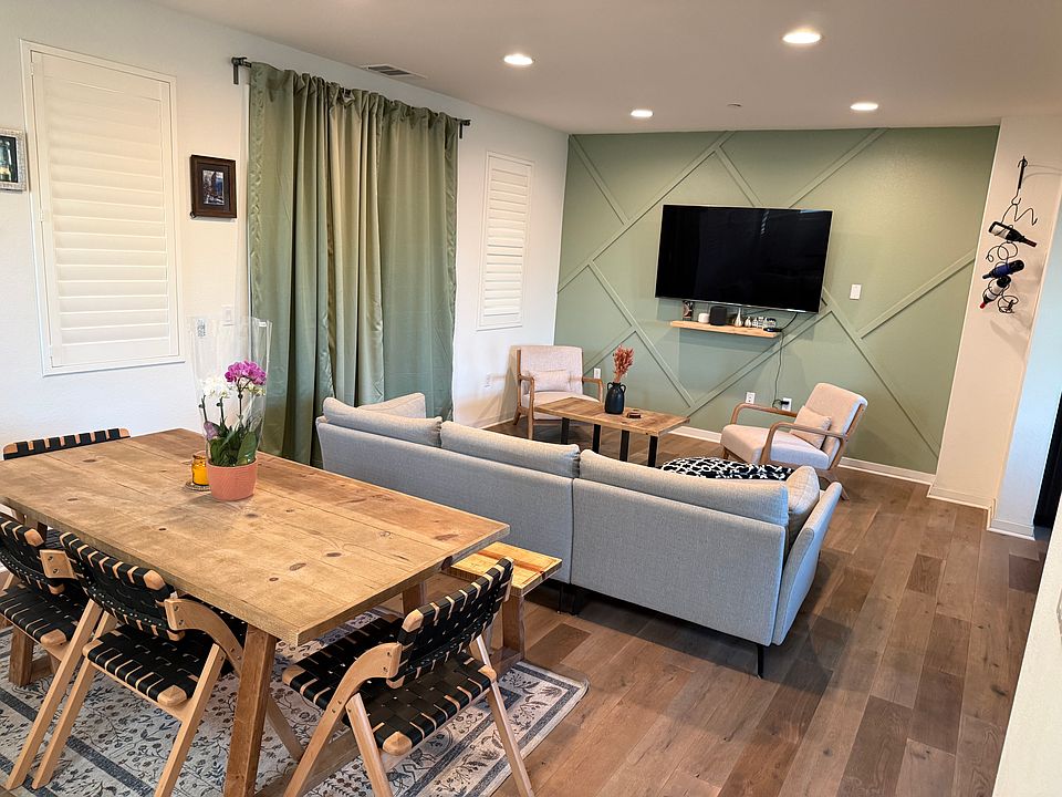 Living Room w/ 1/2 Bath and open kitchen. 
At Level 2