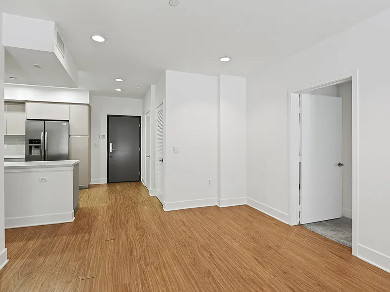 Open-Concept Kitchen, Dining, and Living Room Spaces