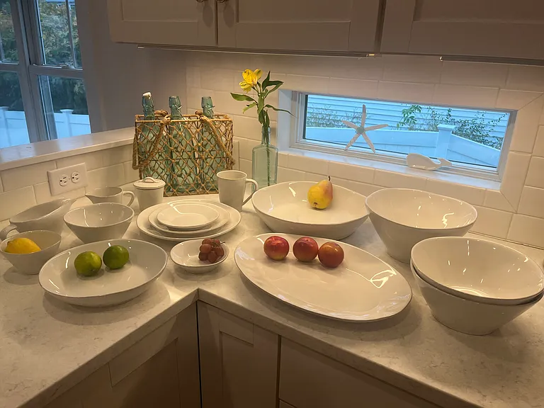 Brand new service for 12 Marin dishes from Crate and Barrel with multiple serving pieces and accessories (platters, 4 serving bowls, sugar and creamer, gravy boat, appetizer plates, ice cream bowls, pasta/meal bowls) and more..