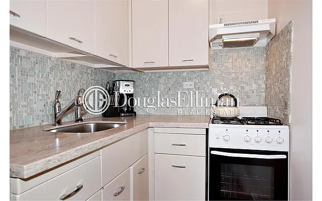 Sold by Douglas Elliman | media 13