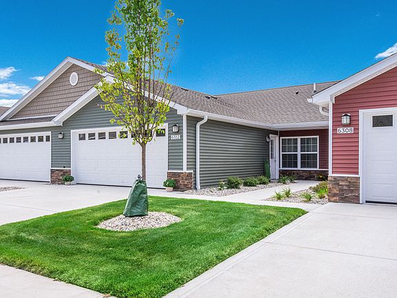 Avoid Bad Weather with an Attached Two-Car Garage and Private Entry