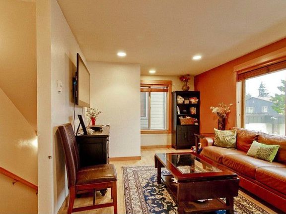 Light and bright main floor living room with Hardwood flooring.