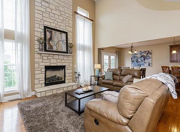 Great Room with 18 foot Ceilings and a Gas Fireplace