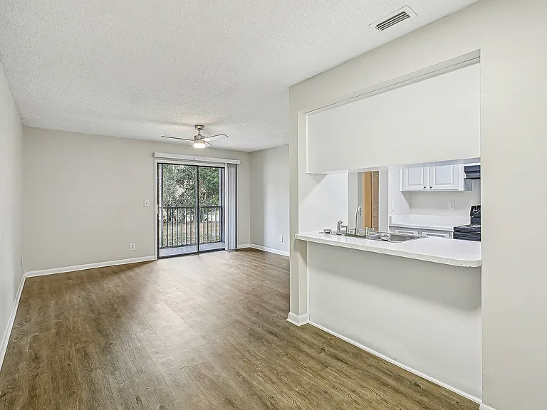 Aria Executive Interior, open-concept living area with natural light.