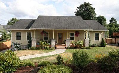A lovely elegant home with such warm inviting curb appeal. House is professionally landscaped with s