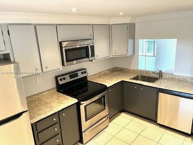 Building Photo - 3920 Inverrary Blvd #204C