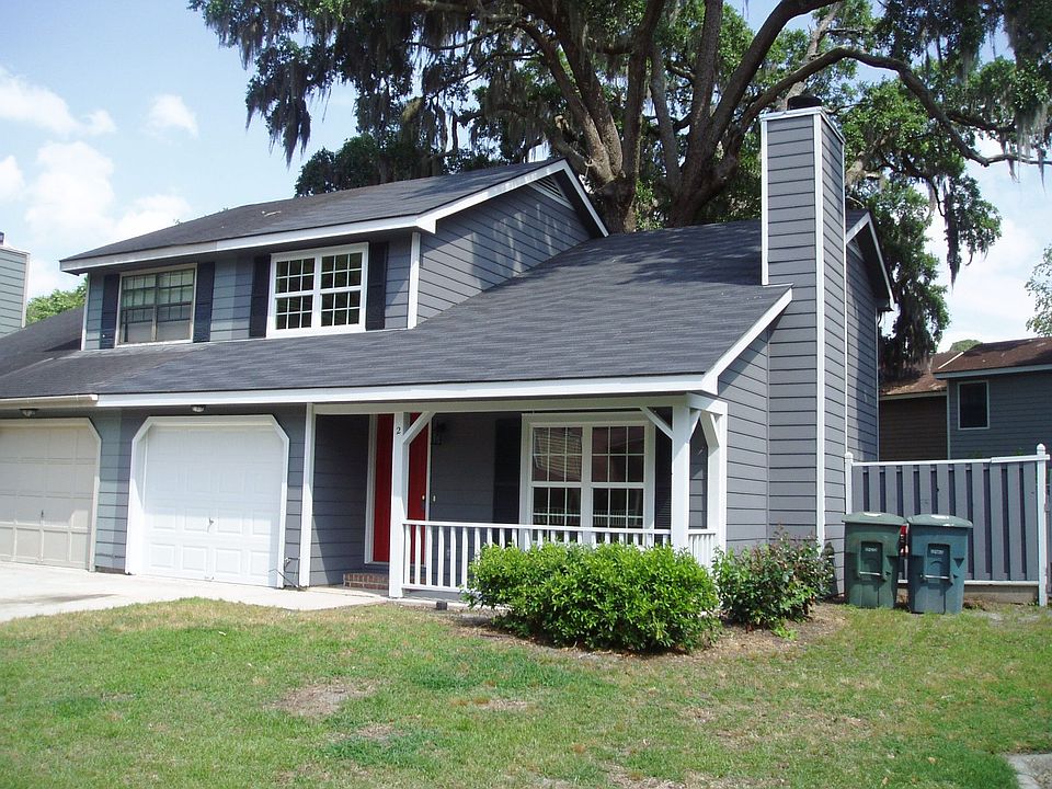 EXTERIOR SHOWING NEW PAINT AND ONE CAR GARAGE