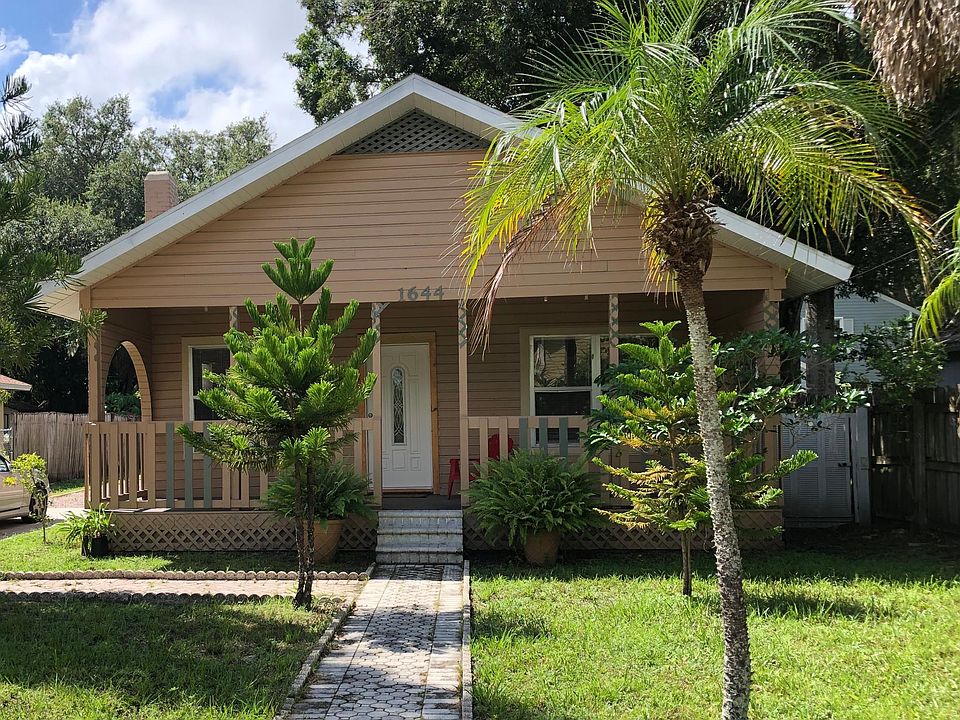 Front of house with large porch