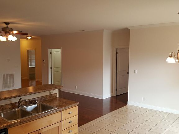 Main level kitchen and living room, laundry room.