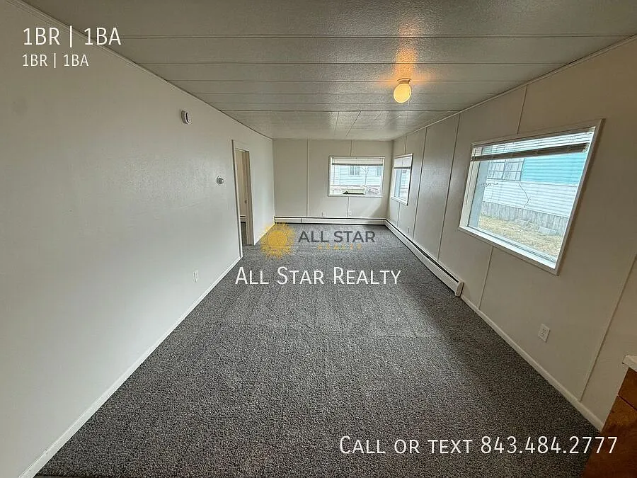 Building Photo - 1100 W 32nd Ave #1
