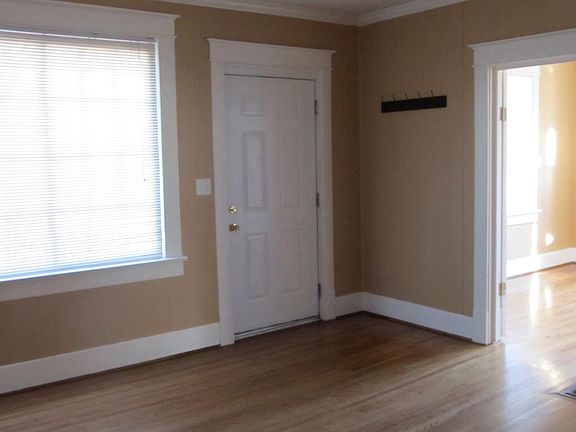 Living room--toward front door & bedroom
