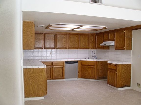 Kitchen has tons of cabinet space