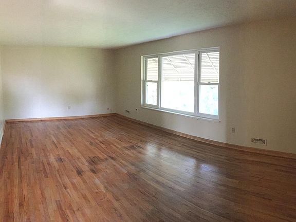 13' x 23' Living Room with 3 large windows