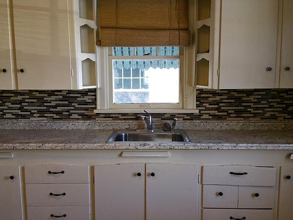 white kitchen with new appliances