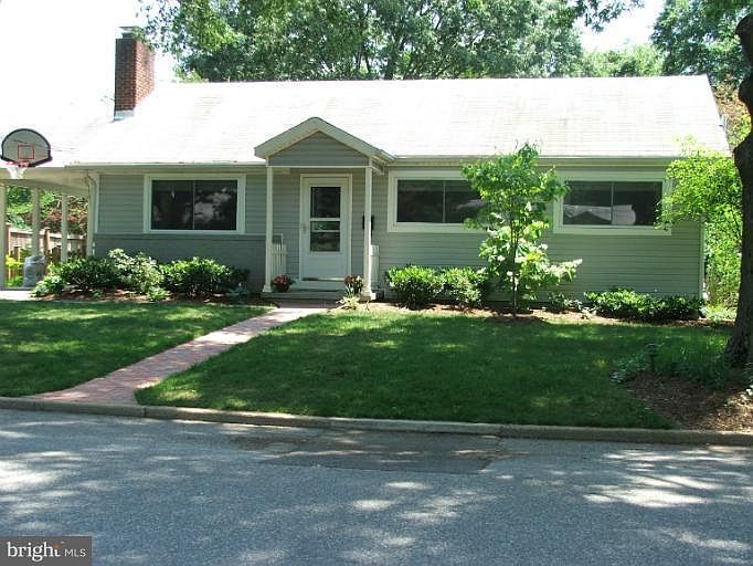 Front of house with Carport