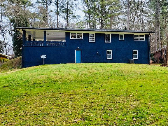 Rear, large yard, separated entry to basement,new windows