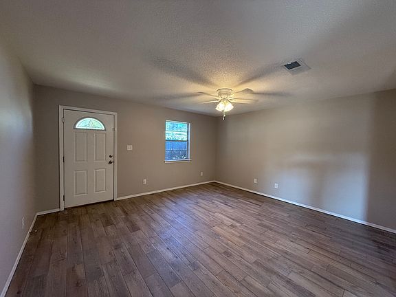 View from kitchen towards front door