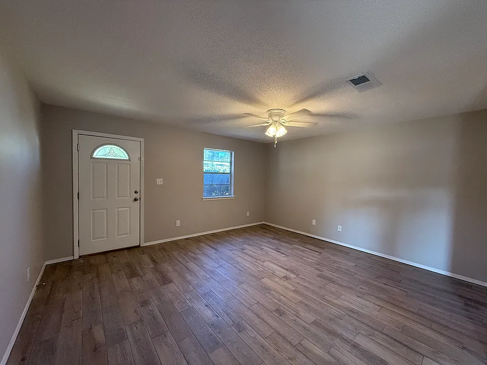 View from kitchen towards front door