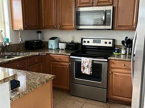 5th image of 3178 NW 103rd Pl #0