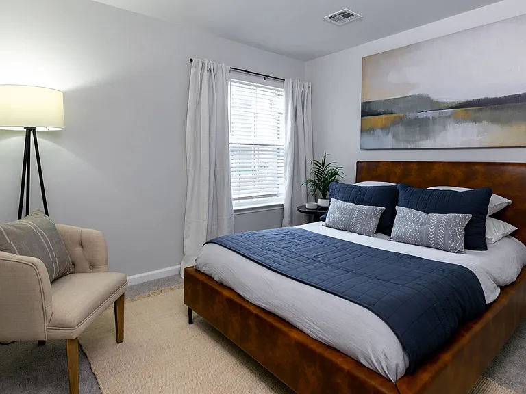 Indulge in bedroom luxury, featuring plush comforts and generous closets.