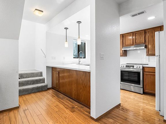 Kitchen and stairway to master bedrooms upstairs