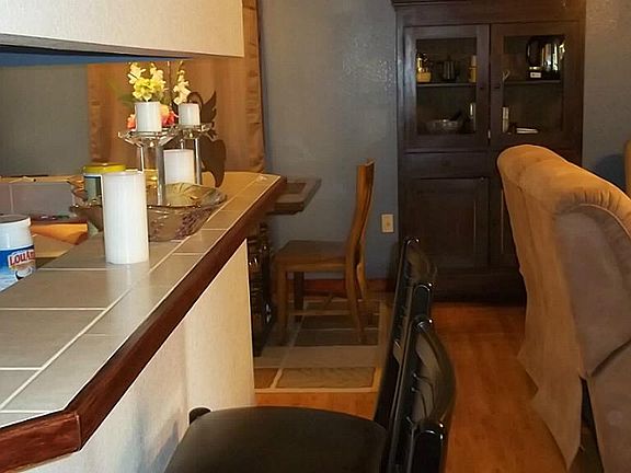 WOOD FLOORING IN DINING/LIVING AREA