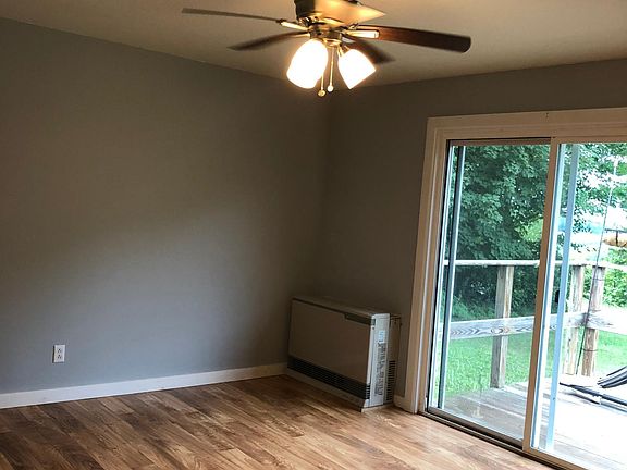 Living Room, Propane heater, sliding glass doors out to deck.