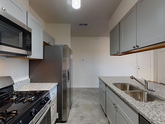 Stainless steel kitchen with granite countertops