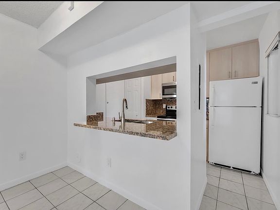 3rd image of 9730 Hammocks Blvd APT 101-28