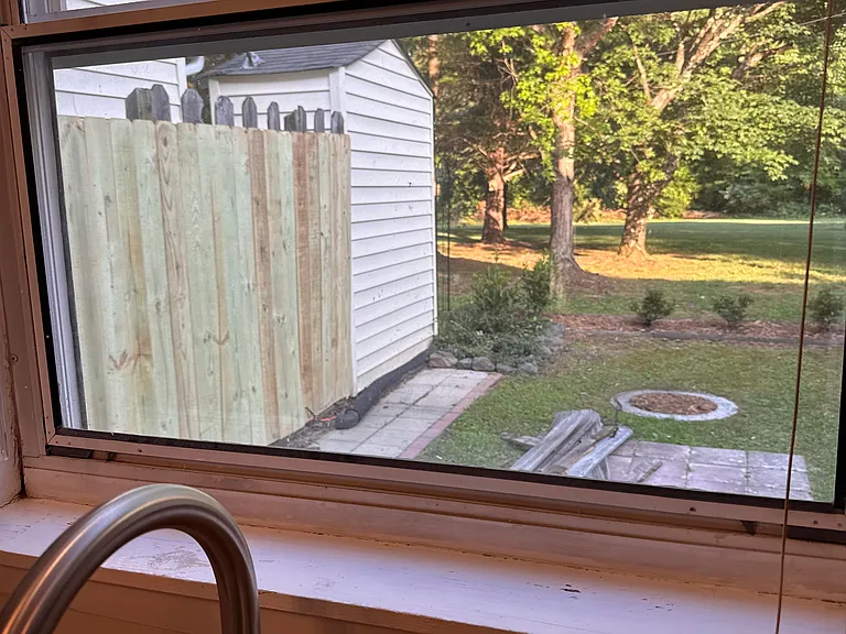 Back yard through Kitchen window