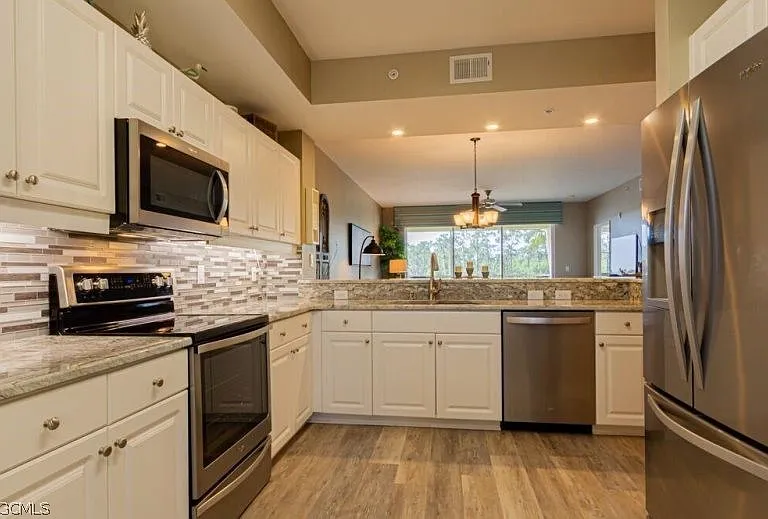 10700 Ravenna Way #303 — Photo 13