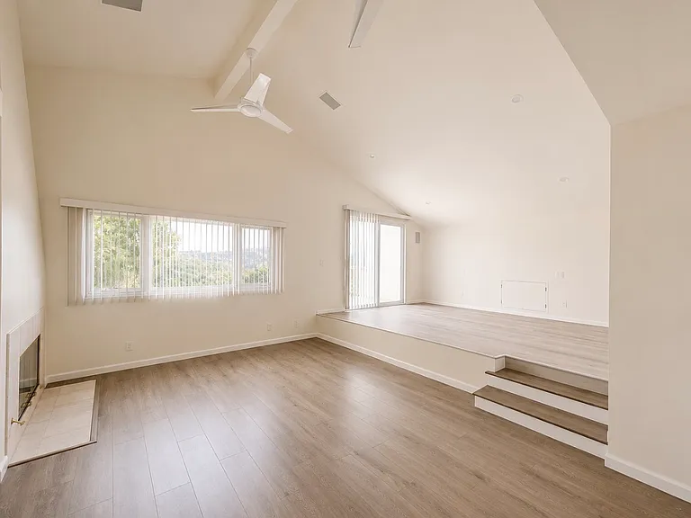 Master Bedroom with fireplace and balcony