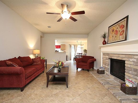 A view of the family room into the kitchen. Plenty of space for family entertaining.