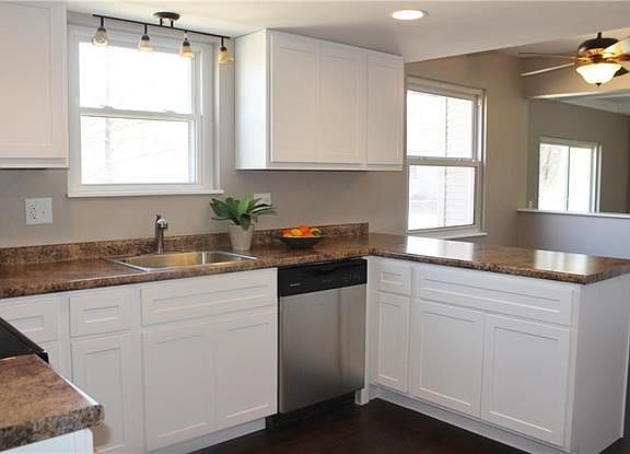 Updated kitchen opens to breakfast room and family room