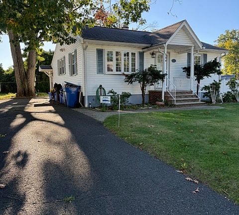 Front view with driveway