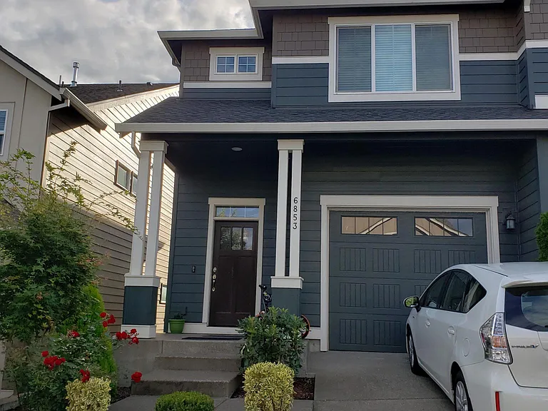 Front house view. Zero maintenance front lawn.