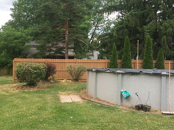 Looking at poolFrom driveway