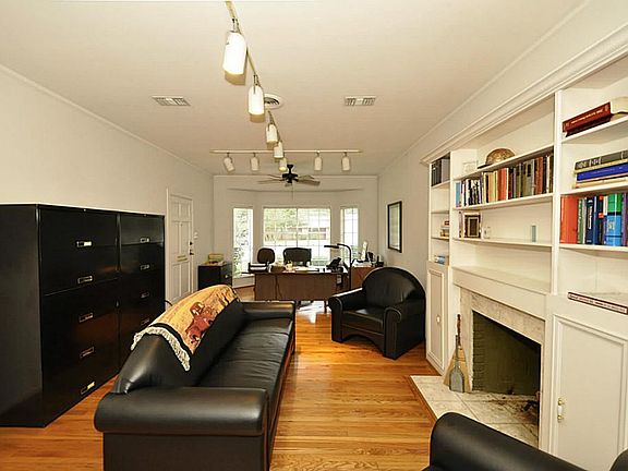 This is a reverse view of the living room. This home was last used as an office.