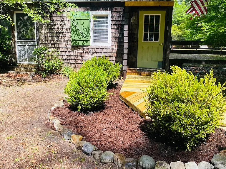 Tired of roommates? Sweet little spot with your own washer, clothesline, outside shower, screened porch, window a/c, creek woods and nature! $1400 mo. $1400 dep. absolutely no pets no smokers