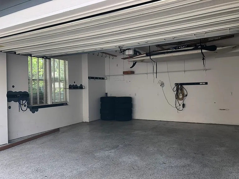 Oversized 2 car garage with EV charger