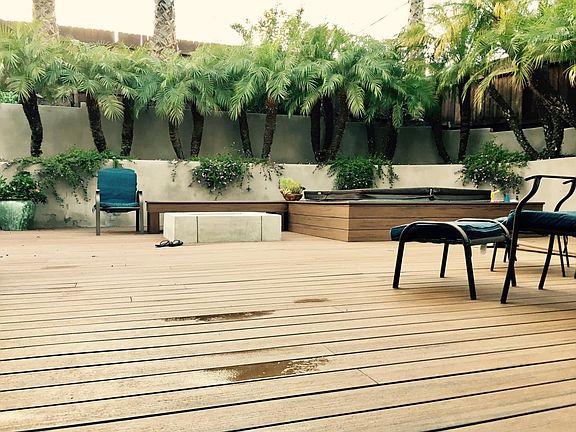 Backyard with fire pit, (hot tub has been removed)