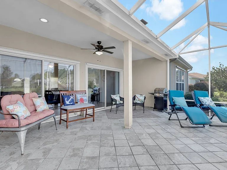 large back deck with view of lagoon and seating for 8
