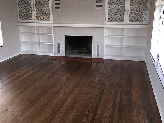 large living room with lots of windows