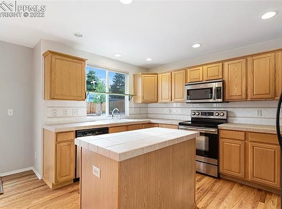 4th image of 8460 Windy Hill Dr
