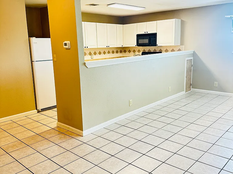 3112 N Aw Grimes Blvd #1 — Photo 2