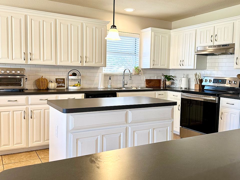 Large kitchen with island and breakfast bar